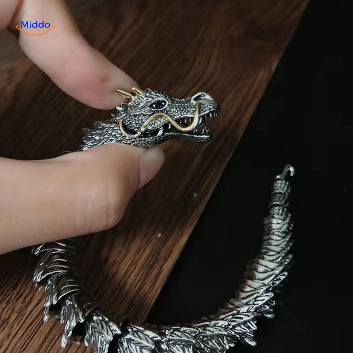 Dragon bone bracelet held in hand demonstrating sturdy construction and solid build.