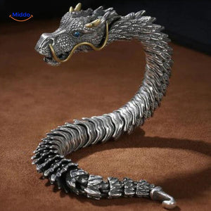 Dragon bone bracelet displayed on leather surface showcasing men's fashion styling.
