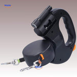 Dual dog leash with flashlight for safe nighttime dog walking.