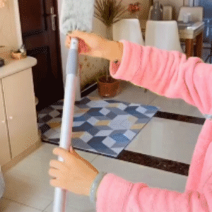 Quick cleaning demonstration showing duster in use around home.