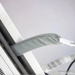 Extendable duster reaching high shelves and ceiling corners safely.