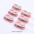 Duvet clips in pink color for bedroom decor coordination