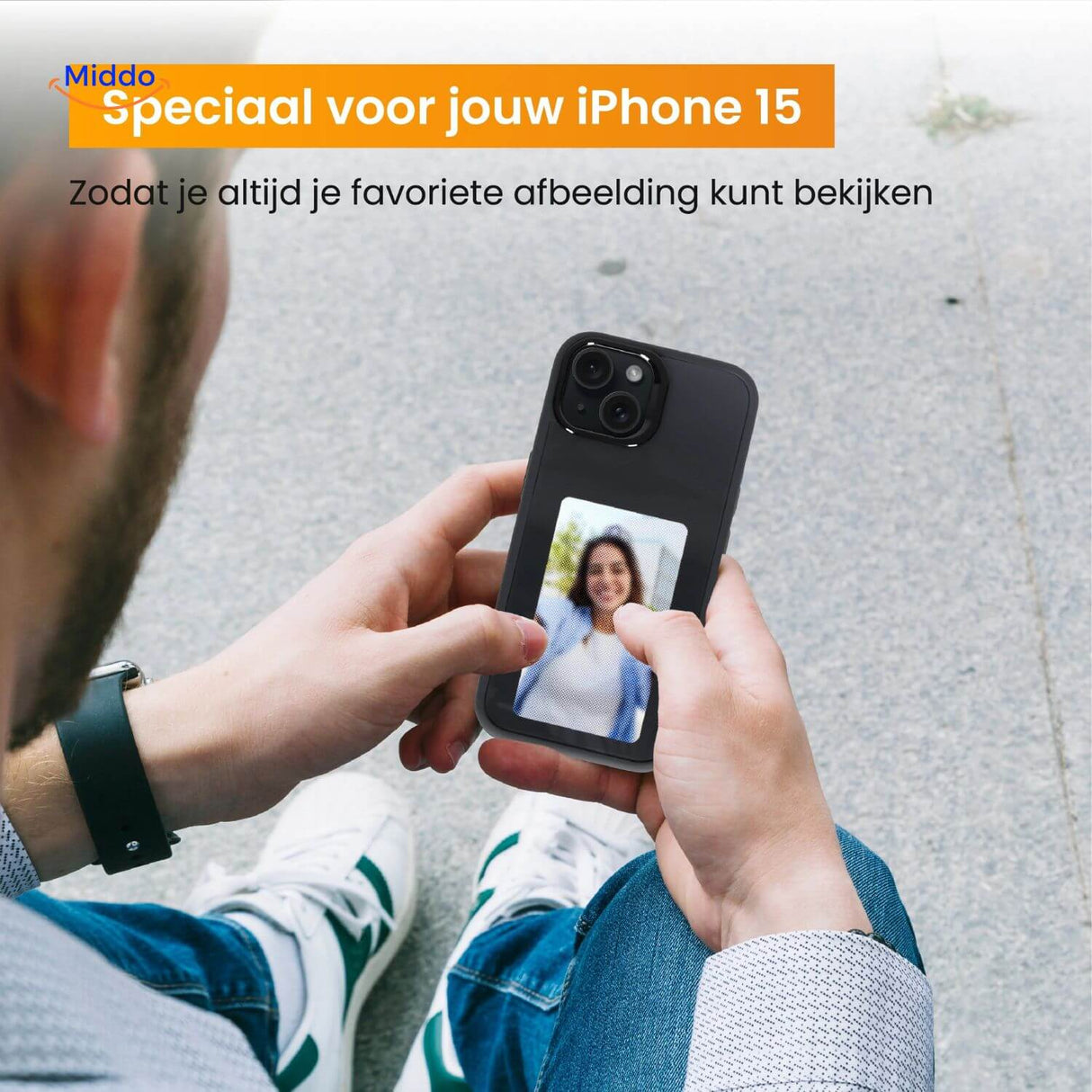 Black e-ink NFC iPhone case with a personal woman's photo on the e-paper screen, lifestyle product shot.