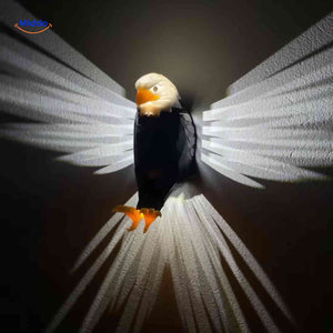 EagleGlow eagle lamp creating stunning 3D shadow projection on wall surface.