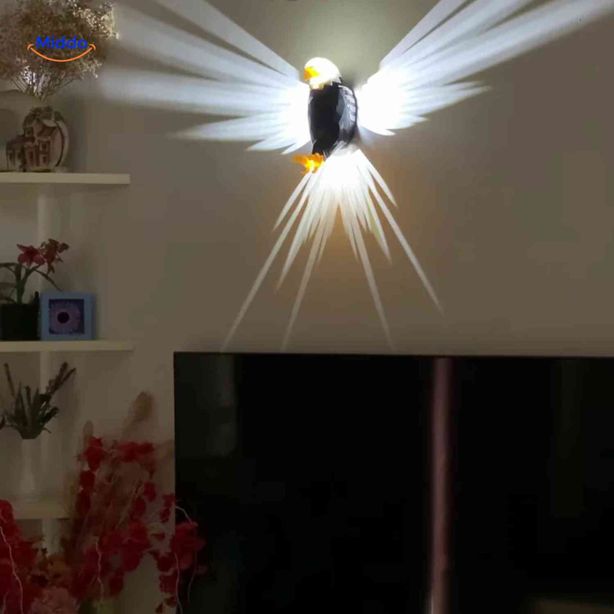 EagleGlow eagle wall lamp mounted above television in modern living room.