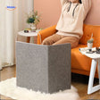 Electric leg warmer with infrared heating keeping feet warm on couch.
