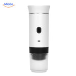 Portable espresso machine with built-in USB charging port for convenient power.