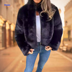 Women's black faux fur coat with high collar and luxe warmth styling.