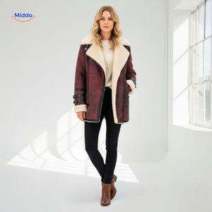 Bordeaux red long faux fur coat with faux leather panel details and warm lining, side view.