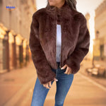 Women's brown faux fur coat with high collar for warm style.