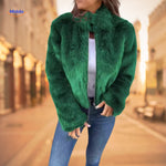 Women's green faux fur coat with high collar and luxe finish.