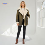 Olive green long faux fur coat with side zipper detail, worn by model in full-length view.