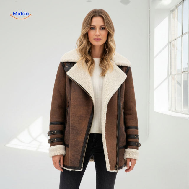 Faux fur lined long winter coat for women in luxurious shearling biker style, front view.