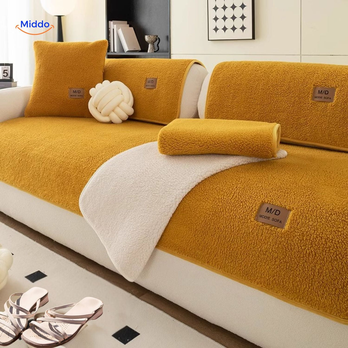 Luxe faux lambswool fabric enhanced with soft yellow-toned throw blankets.