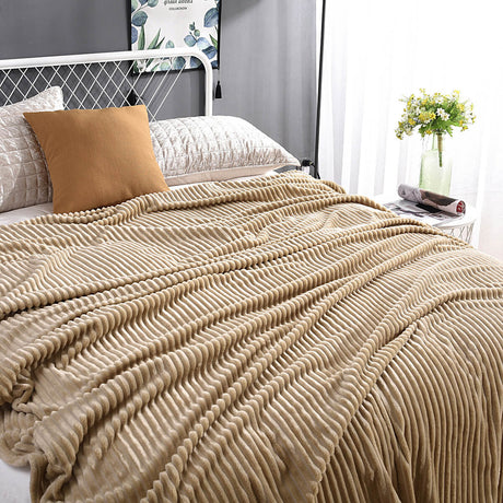 Neutral beige velvet fleece blanket complements any home decor.