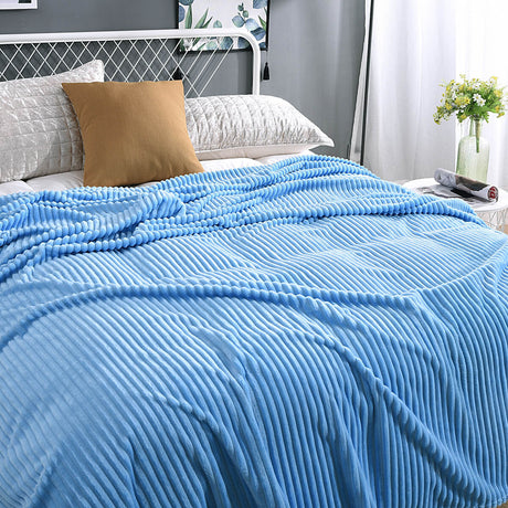 Classic blue velvet fleece blanket ideal for any bedroom style.