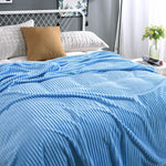 Classic blue velvet fleece blanket ideal for any bedroom style.