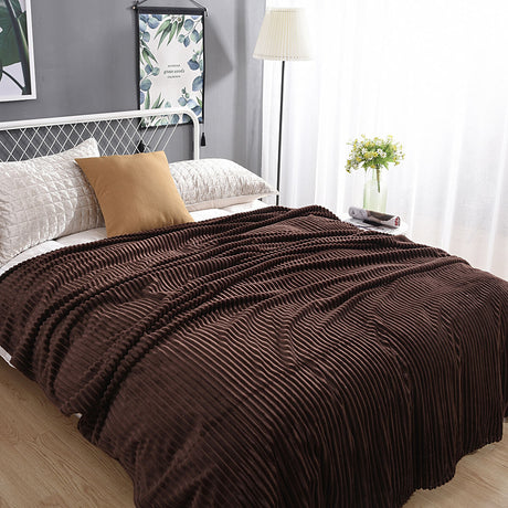 Warm brown velvet fleece blanket offers timeless comfort and style.