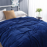 Deep navy blue velvet fleece blanket perfect for any room.