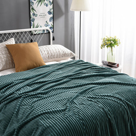 Rich dark green velvet fleece blanket for a sophisticated look.