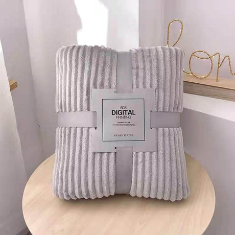 Elegant gray velvet fleece blanket works with any home aesthetic.