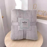 Elegant gray velvet fleece blanket works with any home aesthetic.