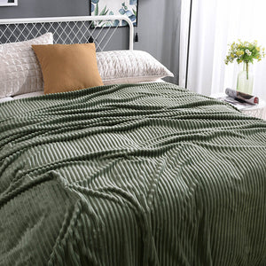 Vibrant green velvet fleece blanket brings nature-inspired comfort.