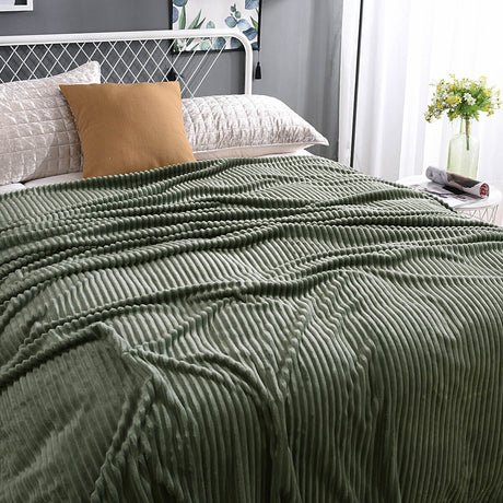 Vibrant green velvet fleece blanket brings nature-inspired comfort.
