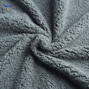 Cozy fleece pet blanket providing warmth and comfort for dogs.