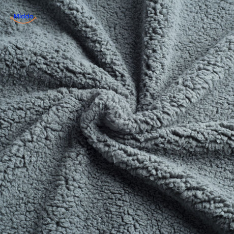 Cozy fleece pet blanket providing warmth and comfort for dogs.