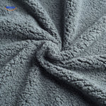 Cozy fleece pet blanket providing warmth and comfort for dogs.