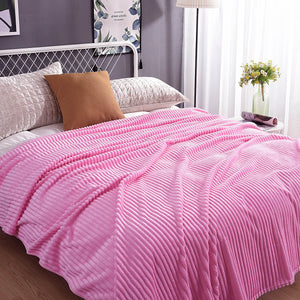 Pretty pink velvet fleece blanket perfect for a cozy bedroom.