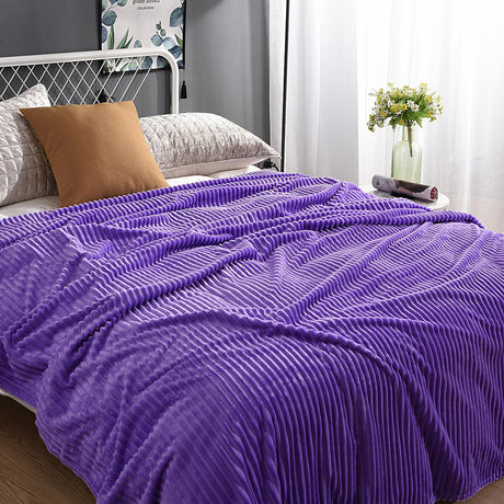 Luxurious purple velvet fleece blanket for ultimate relaxation.