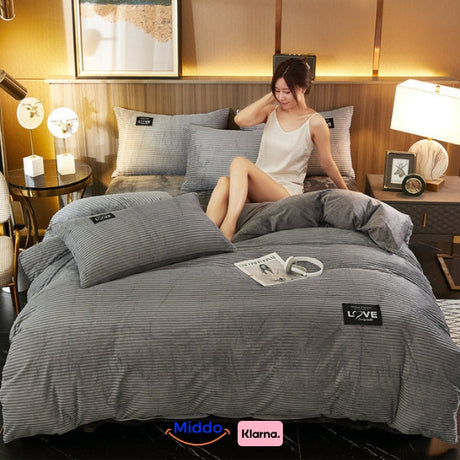 Cozy fleece duvet cover in elegant gray with zipper closure and ultra soft texture.