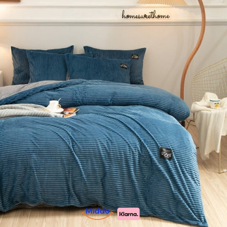 Winter fleece duvet cover in soft light blue perfect for cool bedroom comfort.