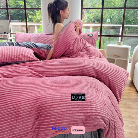 Warm fleece duvet cover in blush pink with plush material and hidden zipper.