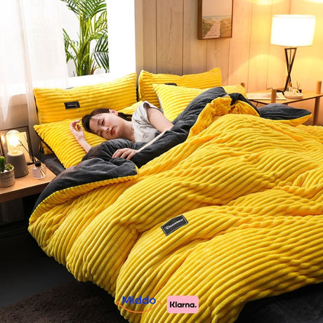 Cheerful yellow fleece duvet cover in soft plush material for winter warmth.