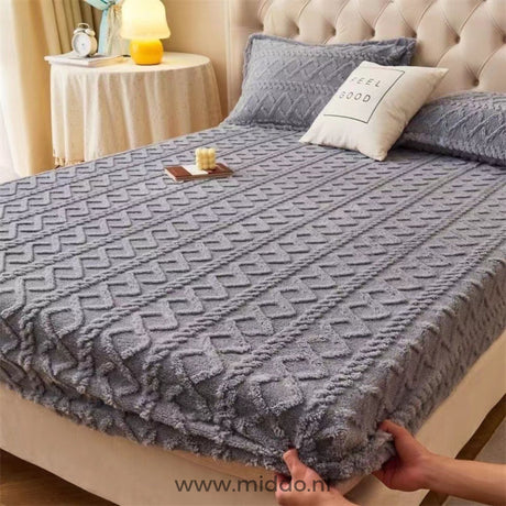 Fleece fitted sheet in versatile grey color option.