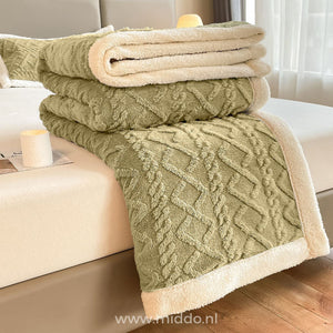 Fleece fitted sheet folded display showing thickness quality.
