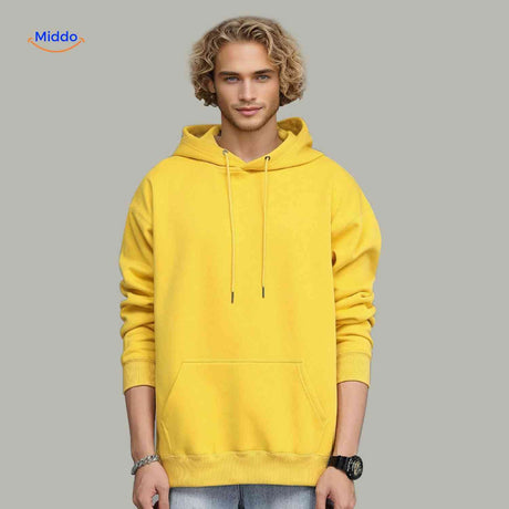 Yellow fleece hoodie worn by man demonstrating masculine fit