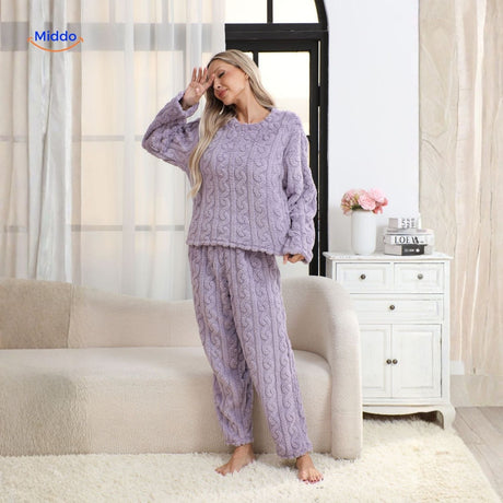 Soft blue fleece pajama set with long sleeves for cold nights.