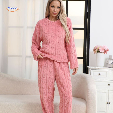 Pink fleece pajama set offering soft comfort and warmth for bedtime.
