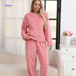 Pink fleece pajama set offering soft comfort and warmth for bedtime.