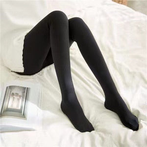 Double-weight black fleece tights with half-foot cut for flexibility.