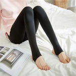 Black fleece-lined tights with practical half-foot cut option.