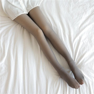 Grey fleece-lined tights offering neutral warmth for winter wardrobes.