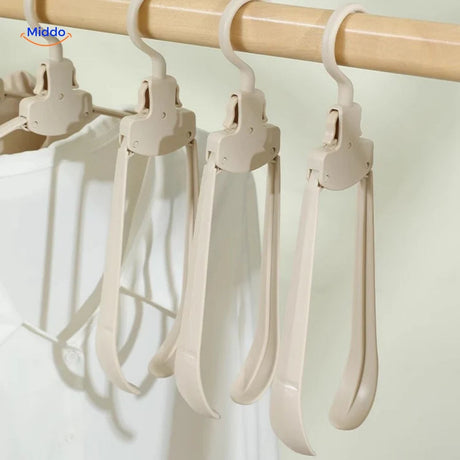 FlexiHanger Pro durable adjustable hanger for versatile home and travel use.