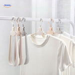 FlexiHanger Pro portable folding clothes hanger for travel and home organization.