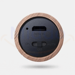 Bottom view of motion-activated LED lamp showing sensor and charging port.