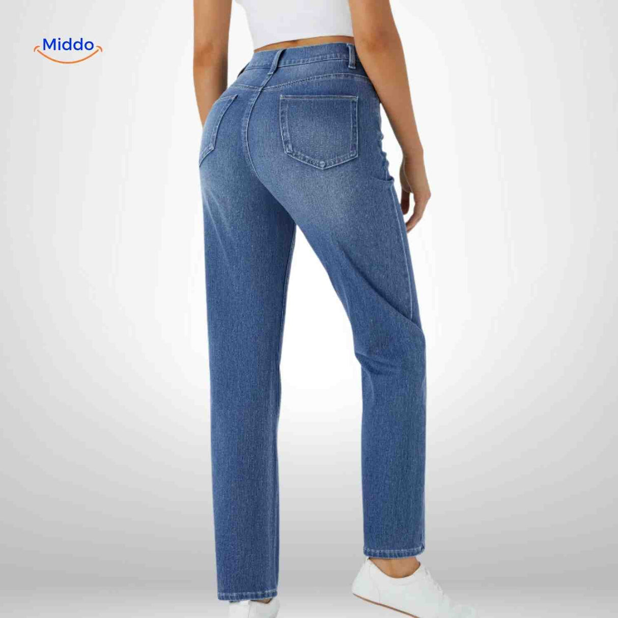 Flexiva high-waist jeans in blue seen from behind with flattering silhouette.